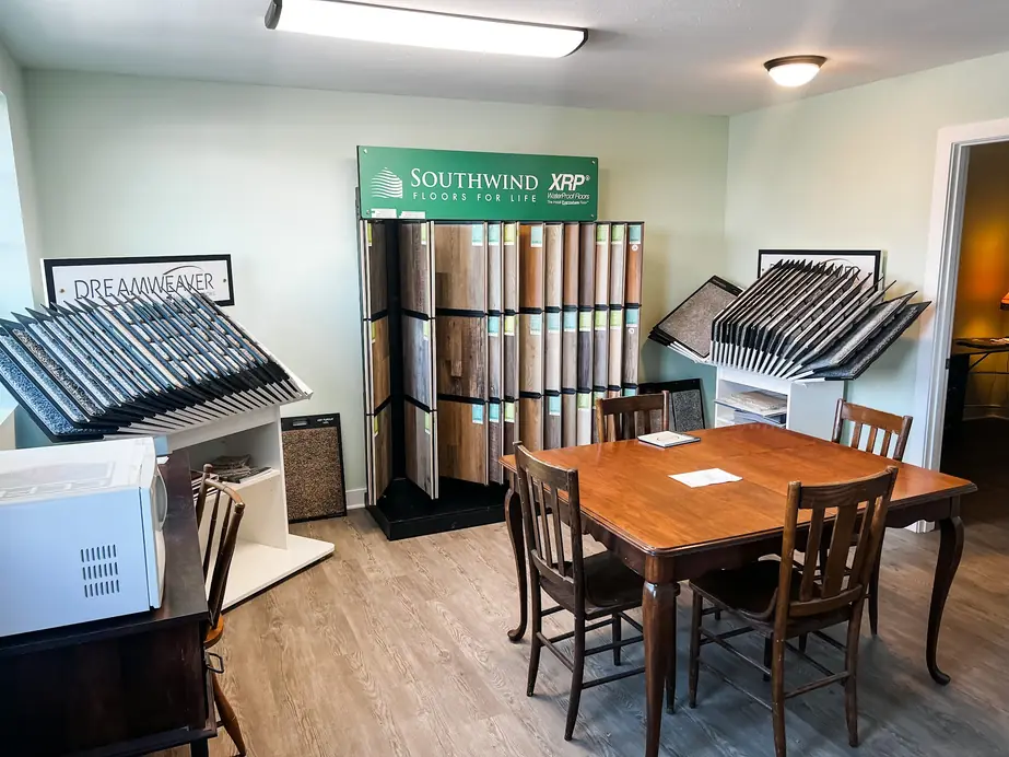 Southwind XRP plank displays and a sample table inside the Mapleton showroom